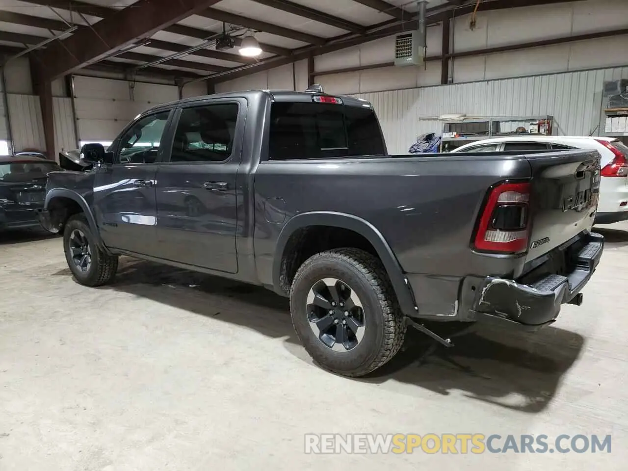 2 Photograph of a damaged car 1C6SRFLT4KN874338 RAM 1500 2019