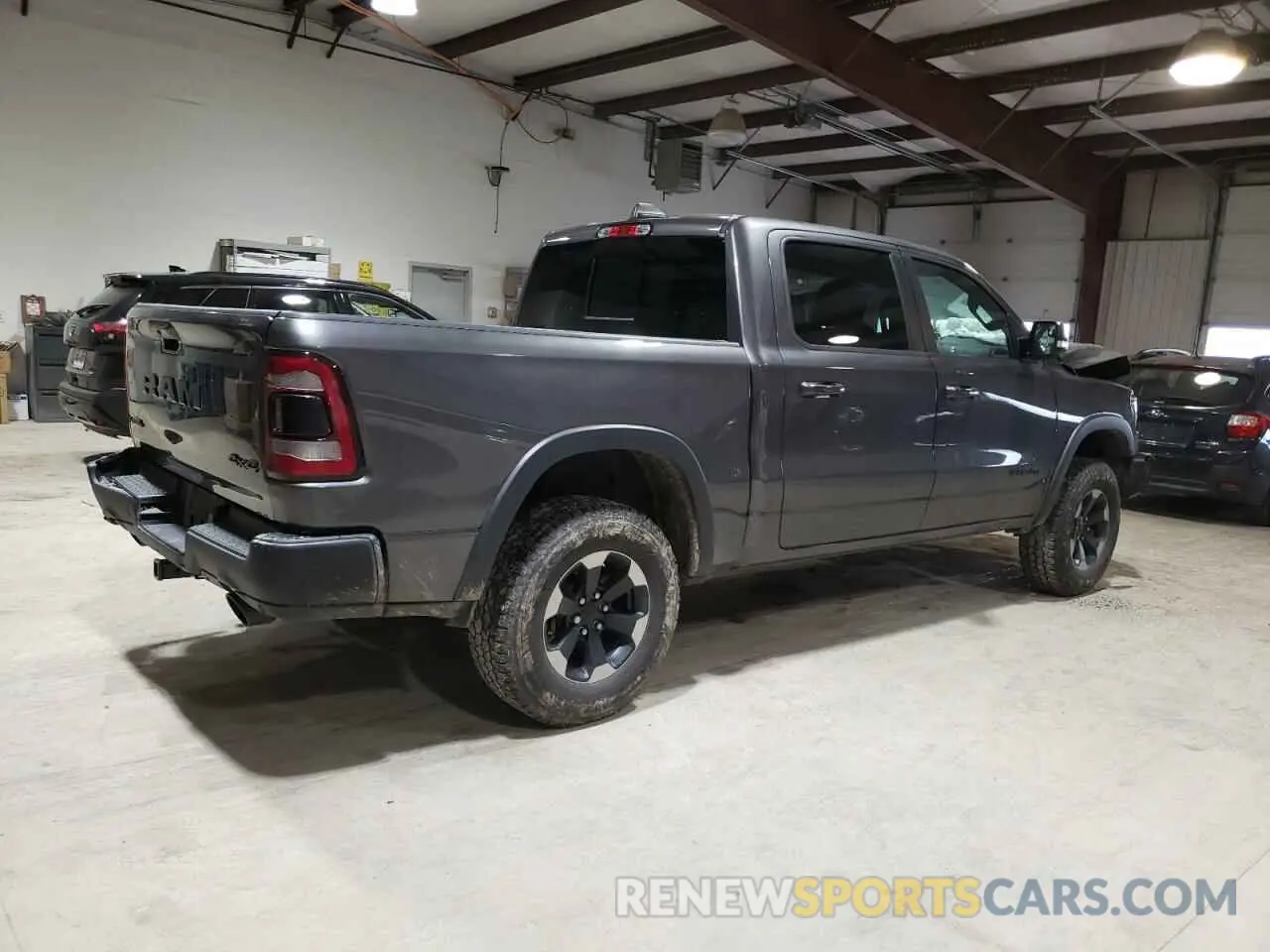 3 Photograph of a damaged car 1C6SRFLT4KN874338 RAM 1500 2019