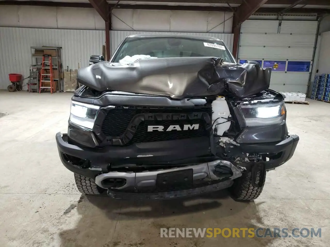 5 Photograph of a damaged car 1C6SRFLT4KN874338 RAM 1500 2019