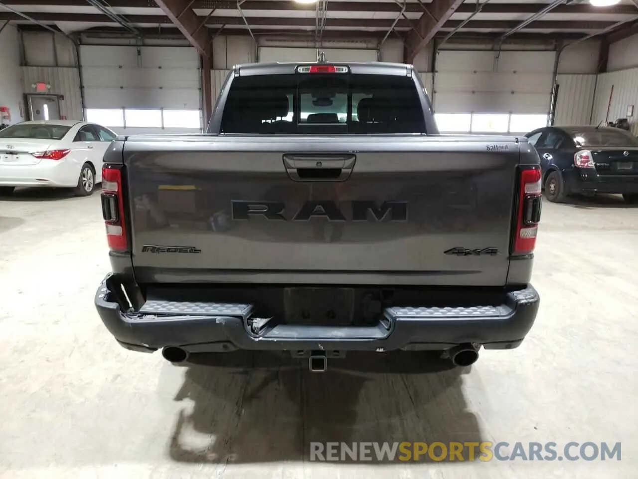 6 Photograph of a damaged car 1C6SRFLT4KN874338 RAM 1500 2019