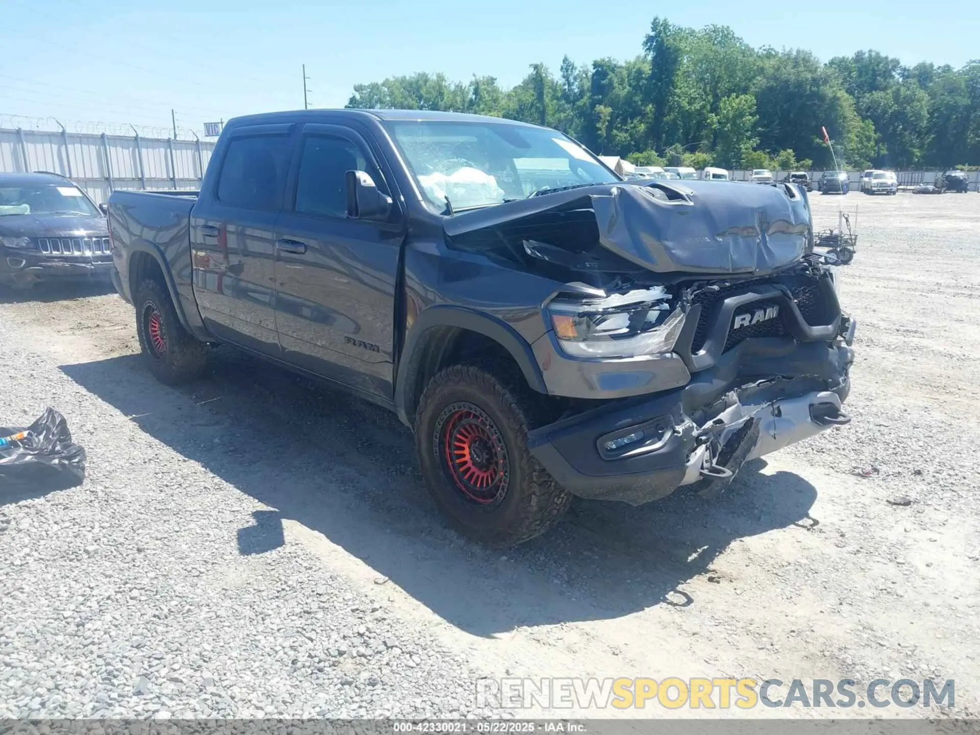 1 Photograph of a damaged car 1C6SRFLT5KN749669 RAM 1500 2019