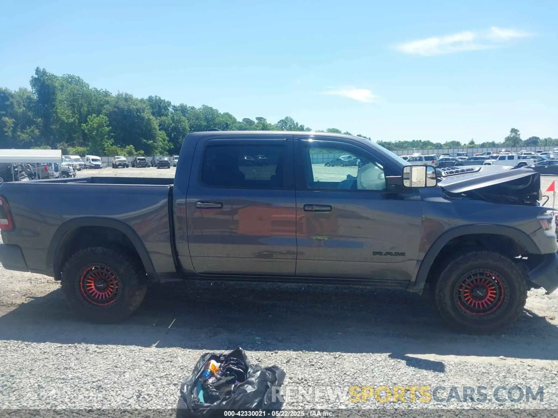 13 Photograph of a damaged car 1C6SRFLT5KN749669 RAM 1500 2019