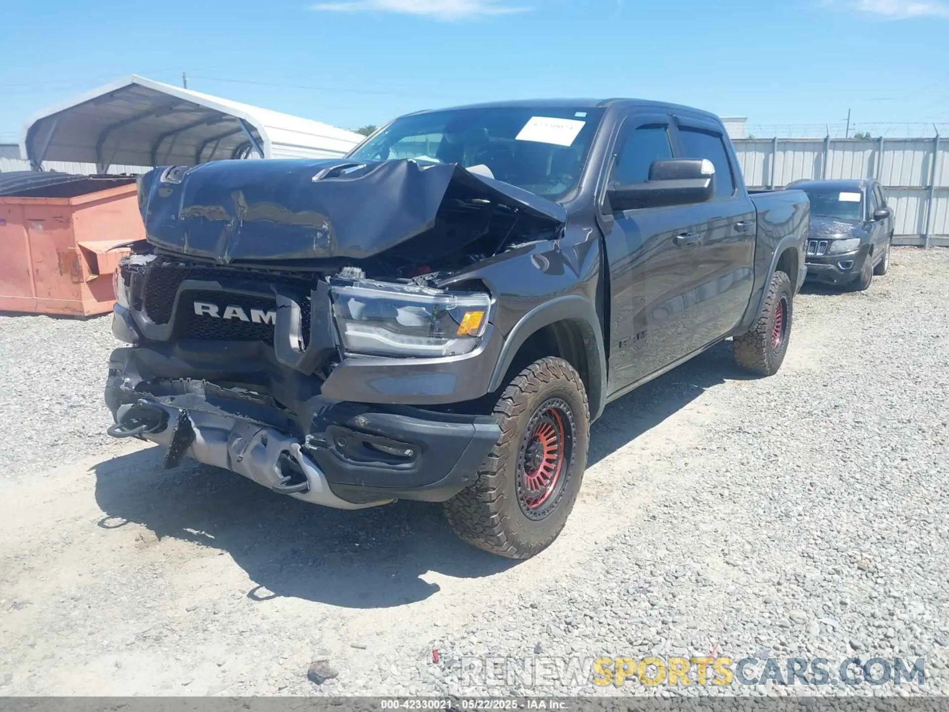 2 Photograph of a damaged car 1C6SRFLT5KN749669 RAM 1500 2019