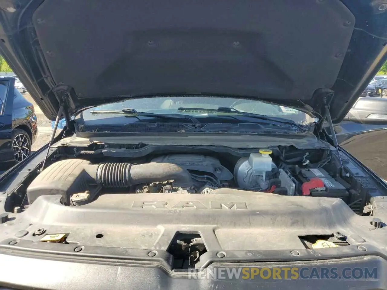 11 Photograph of a damaged car 1C6SRFLT5KN811457 RAM 1500 2019