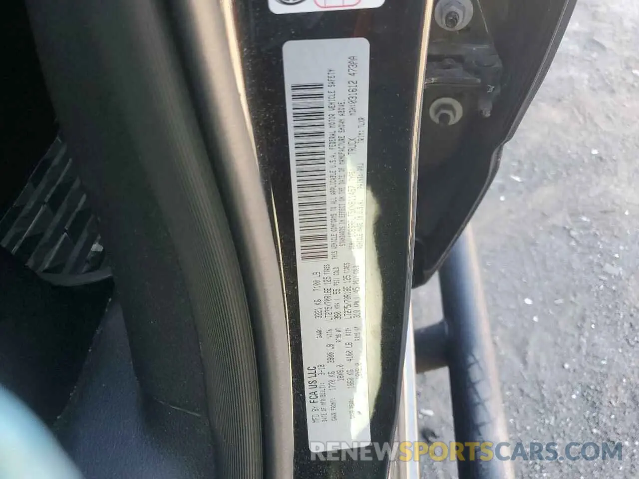 12 Photograph of a damaged car 1C6SRFLT5KN811457 RAM 1500 2019
