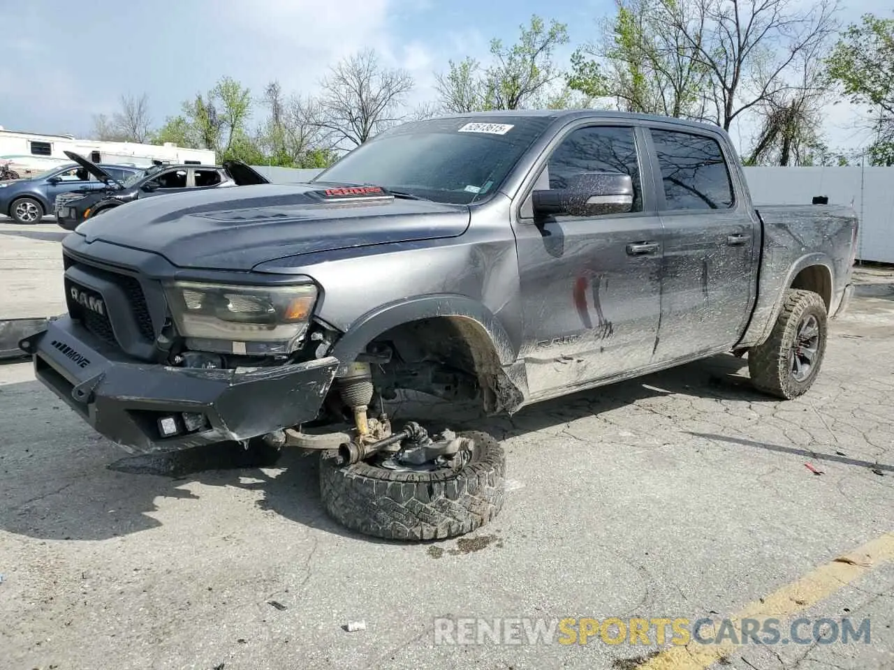 1 Photograph of a damaged car 1C6SRFLT6KN559489 RAM 1500 2019