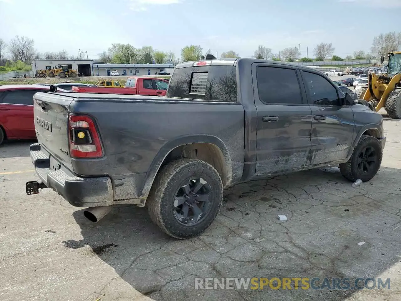 3 Photograph of a damaged car 1C6SRFLT6KN559489 RAM 1500 2019