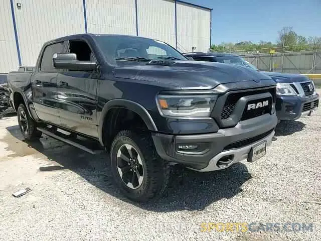 13 Photograph of a damaged car 1C6SRFLT6KN615351 RAM 1500 2019