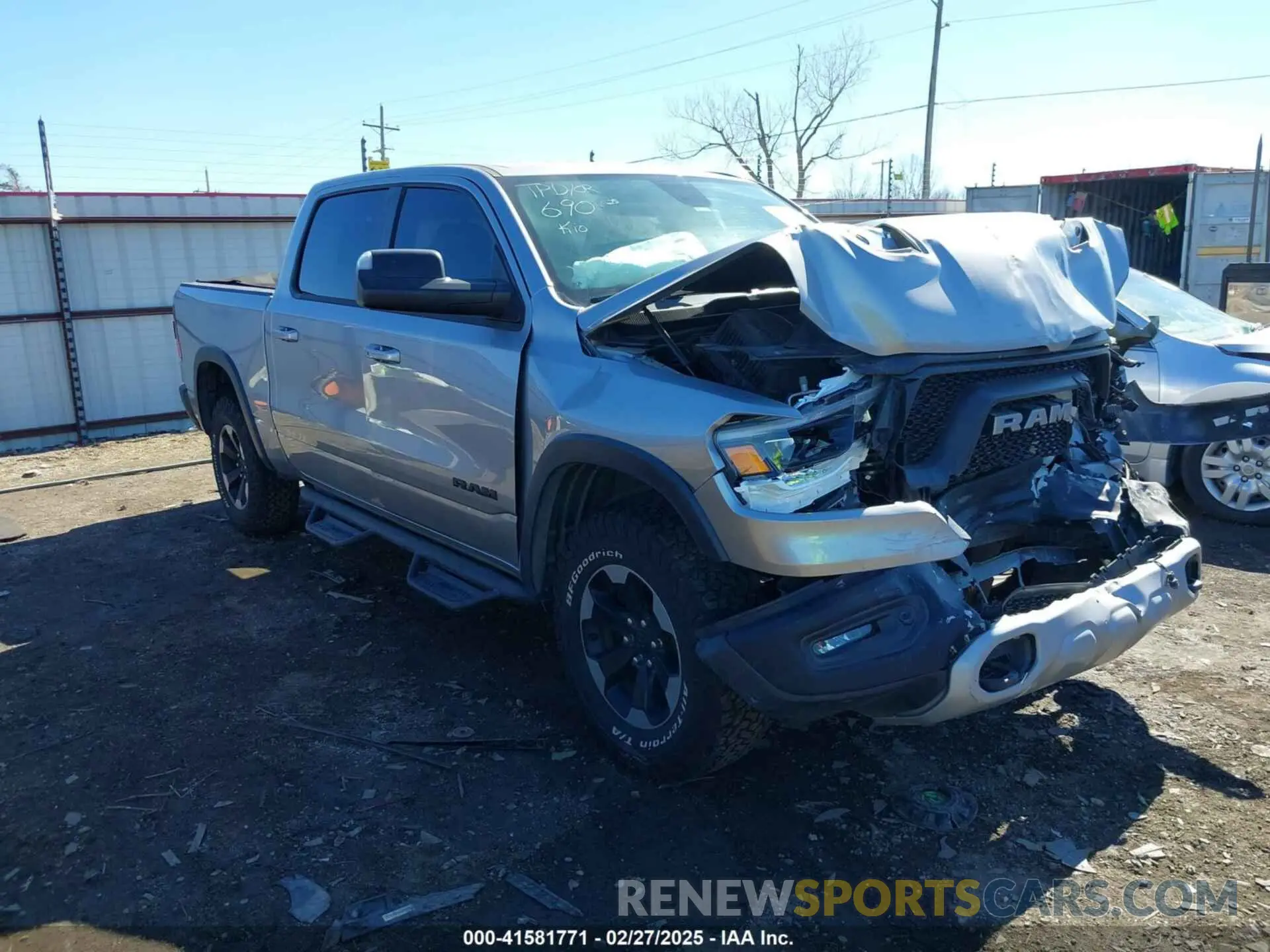 1 Photograph of a damaged car 1C6SRFLT6KN618346 RAM 1500 2019