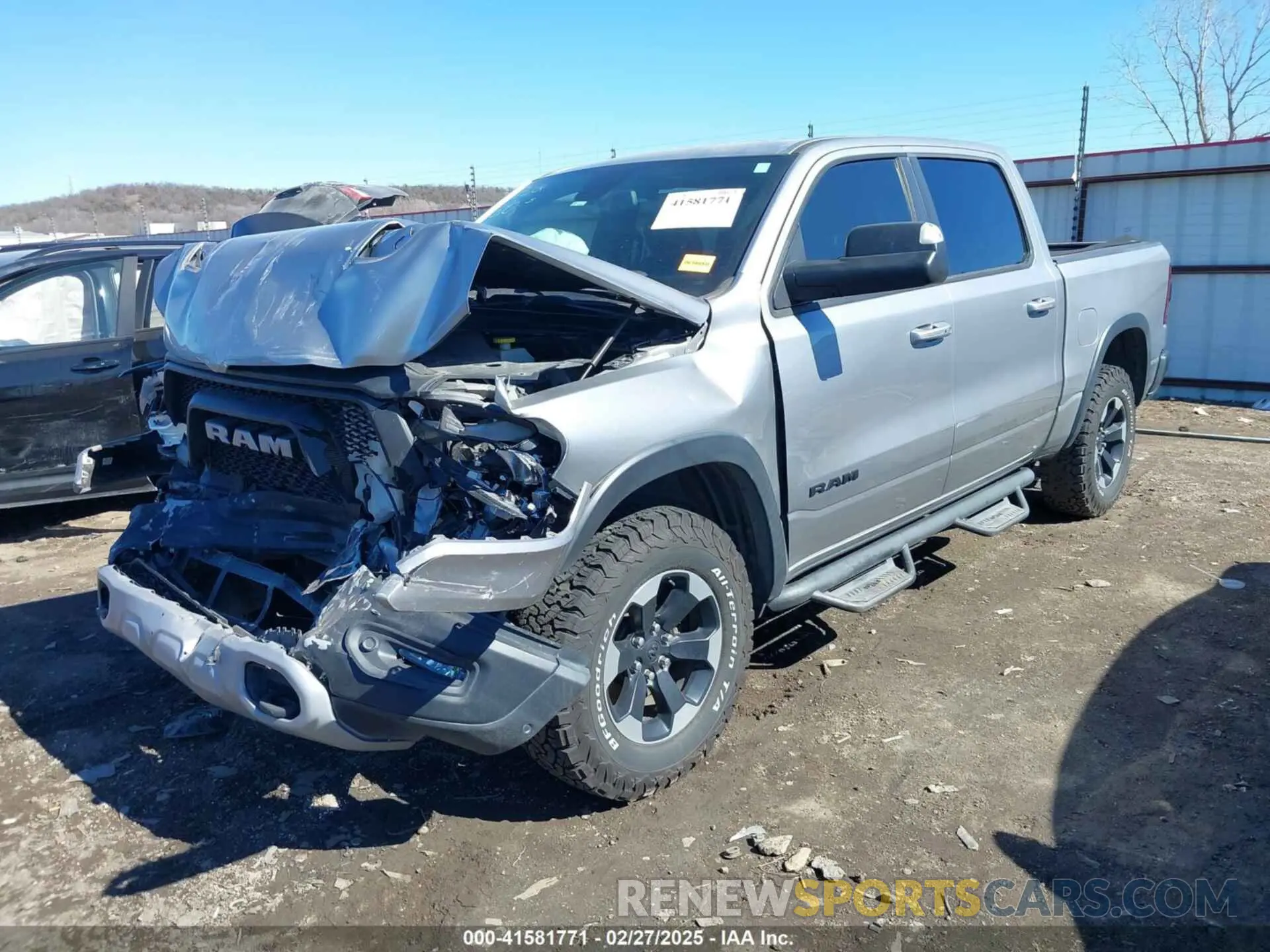 2 Photograph of a damaged car 1C6SRFLT6KN618346 RAM 1500 2019
