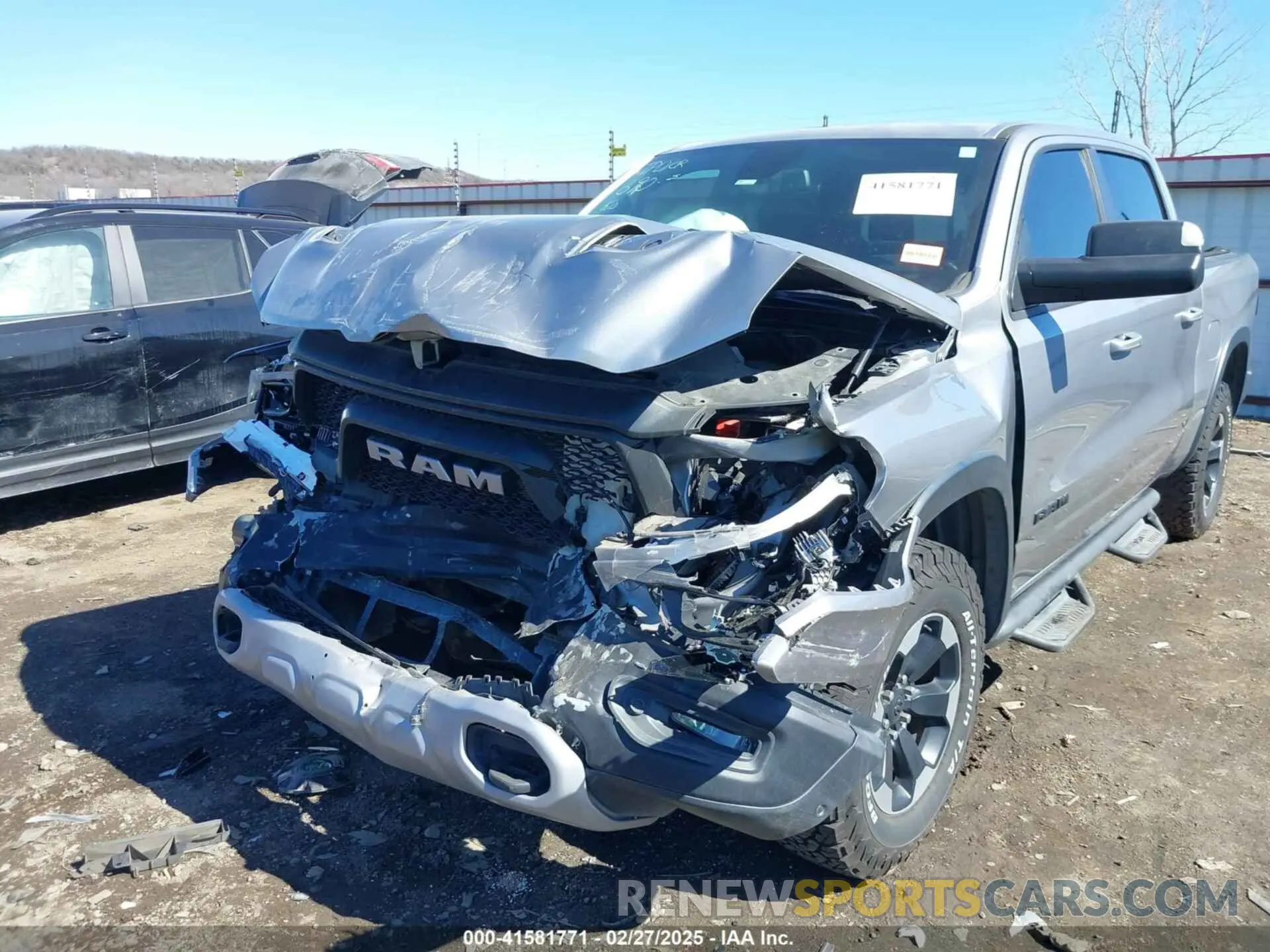 6 Photograph of a damaged car 1C6SRFLT6KN618346 RAM 1500 2019