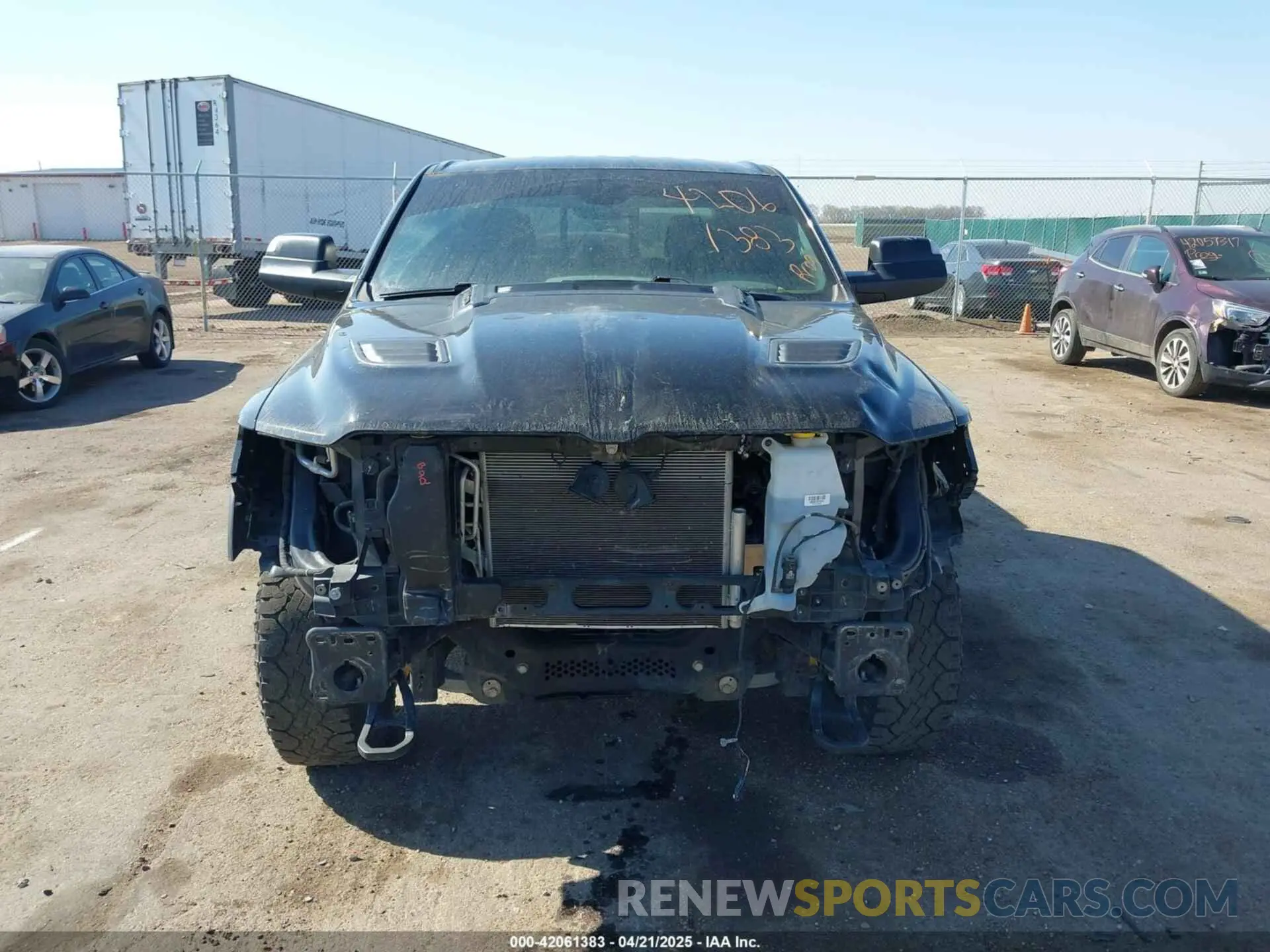 13 Photograph of a damaged car 1C6SRFLT6KN897409 RAM 1500 2019