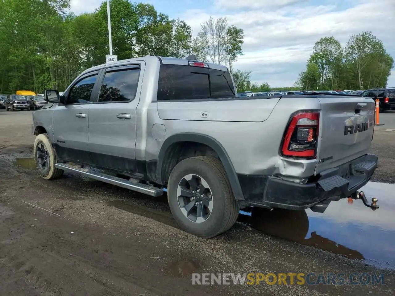 2 Photograph of a damaged car 1C6SRFLT6KN908960 RAM 1500 2019
