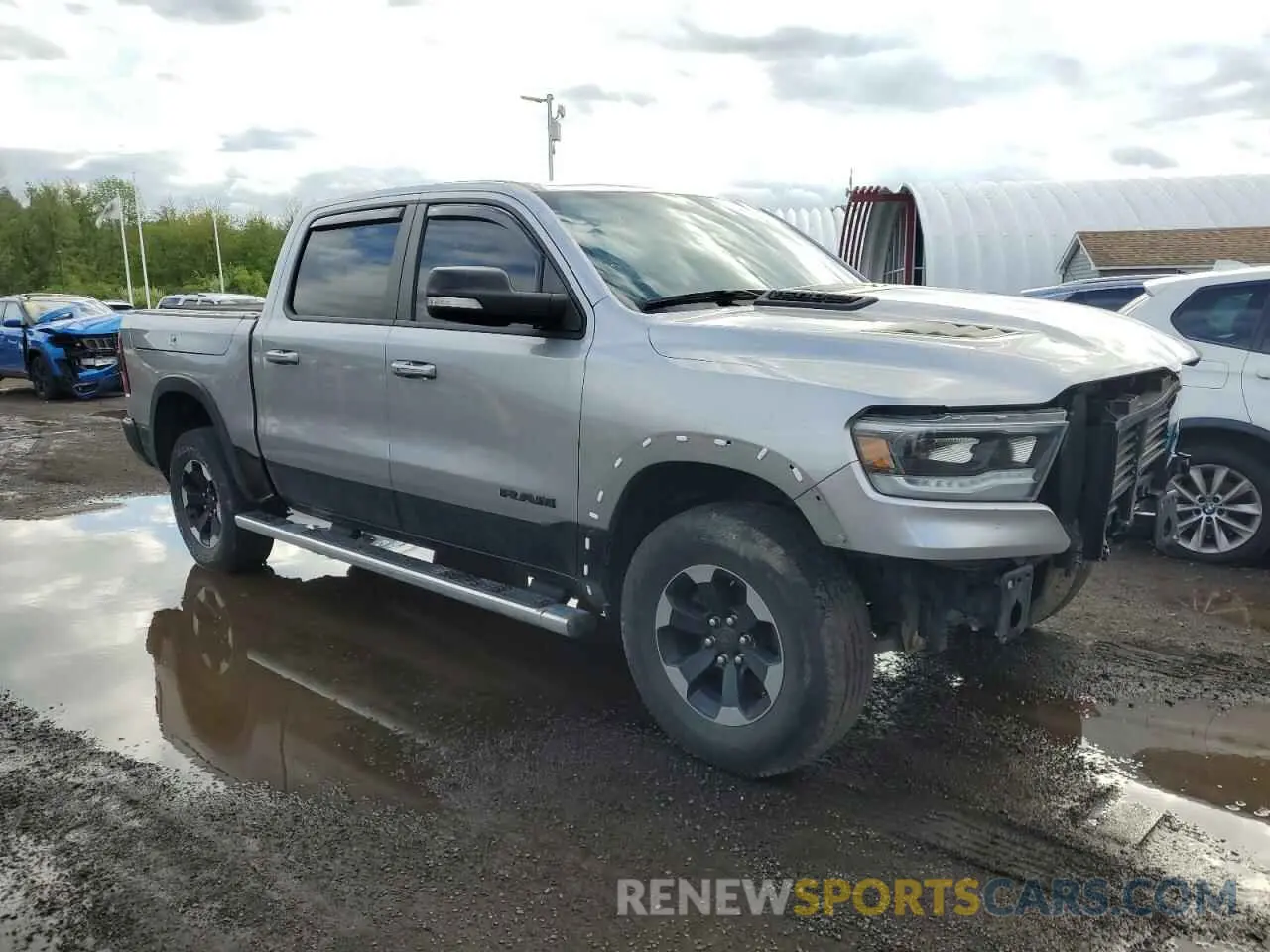 4 Photograph of a damaged car 1C6SRFLT6KN908960 RAM 1500 2019