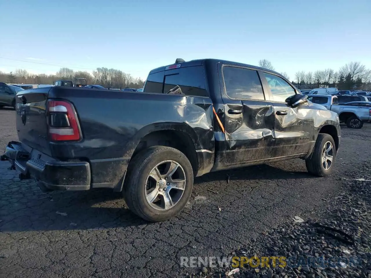3 Photograph of a damaged car 1C6SRFLT7KN545567 RAM 1500 2019