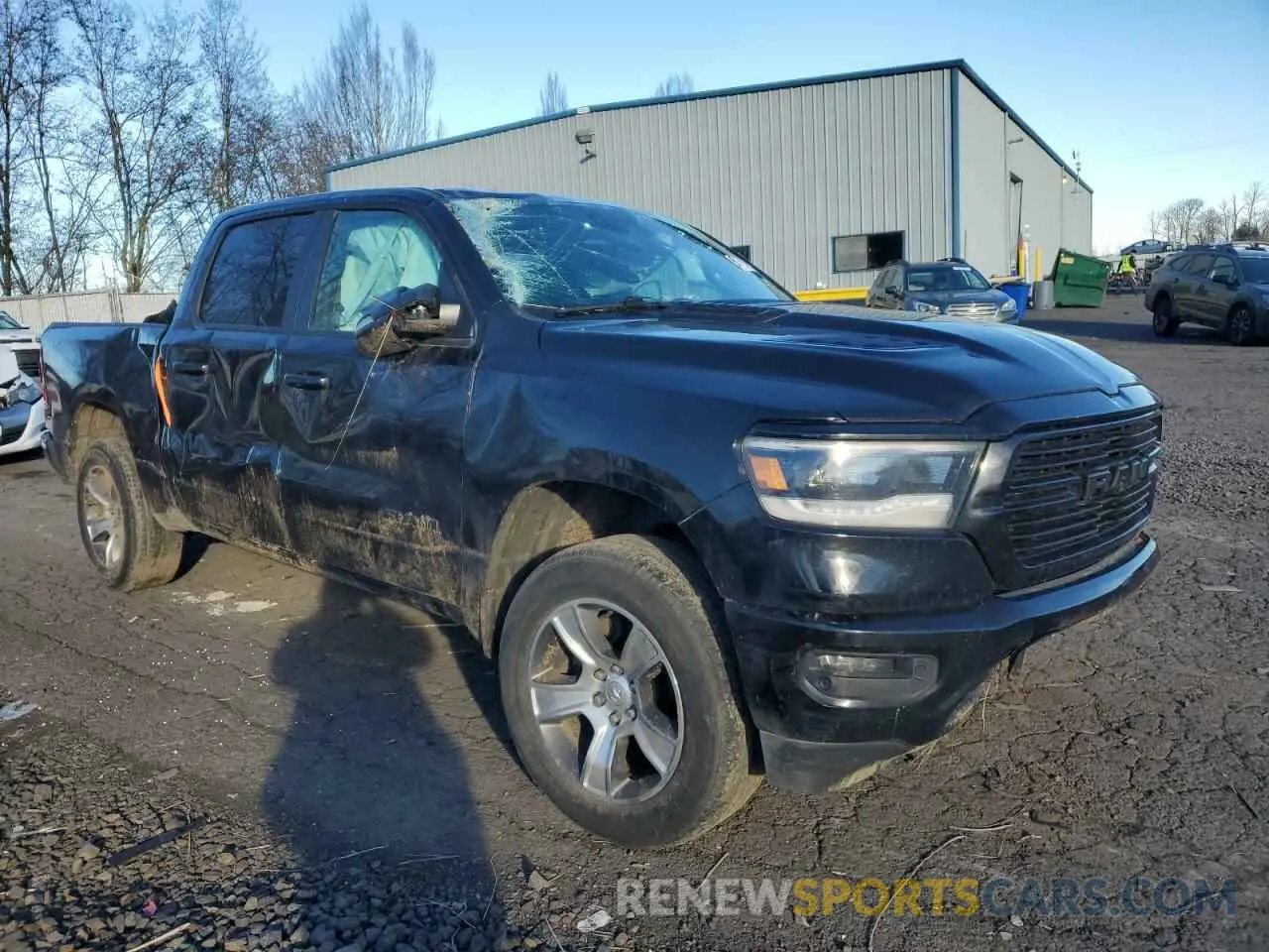 4 Photograph of a damaged car 1C6SRFLT7KN545567 RAM 1500 2019