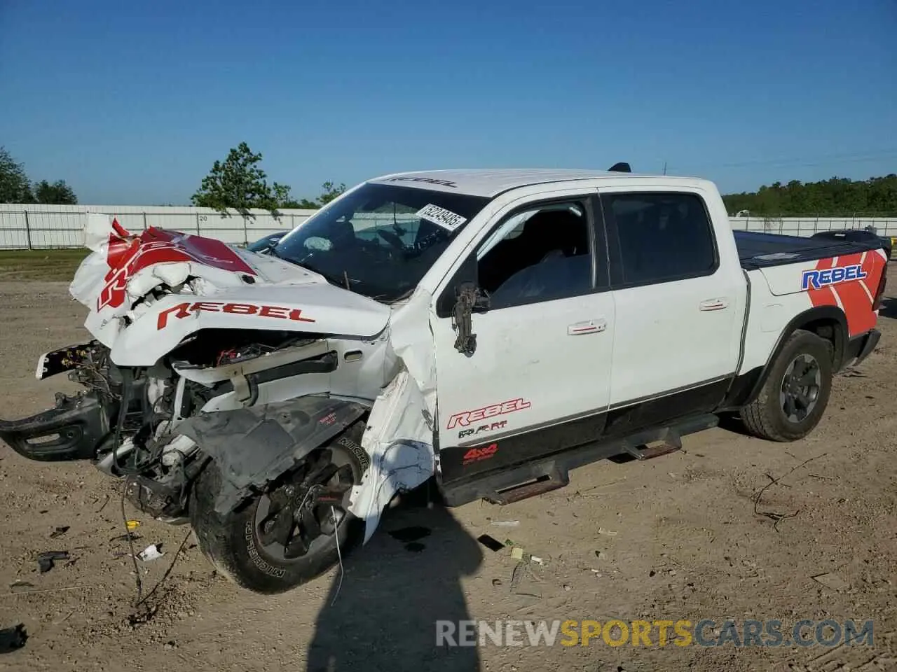 1 Photograph of a damaged car 1C6SRFLT7KN811895 RAM 1500 2019