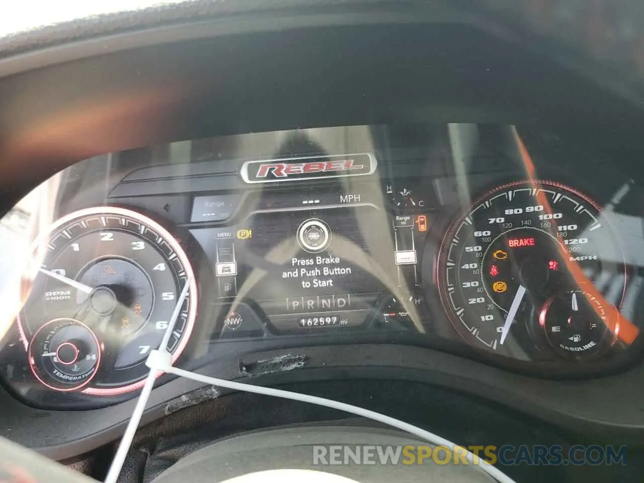 9 Photograph of a damaged car 1C6SRFLT7KN811895 RAM 1500 2019