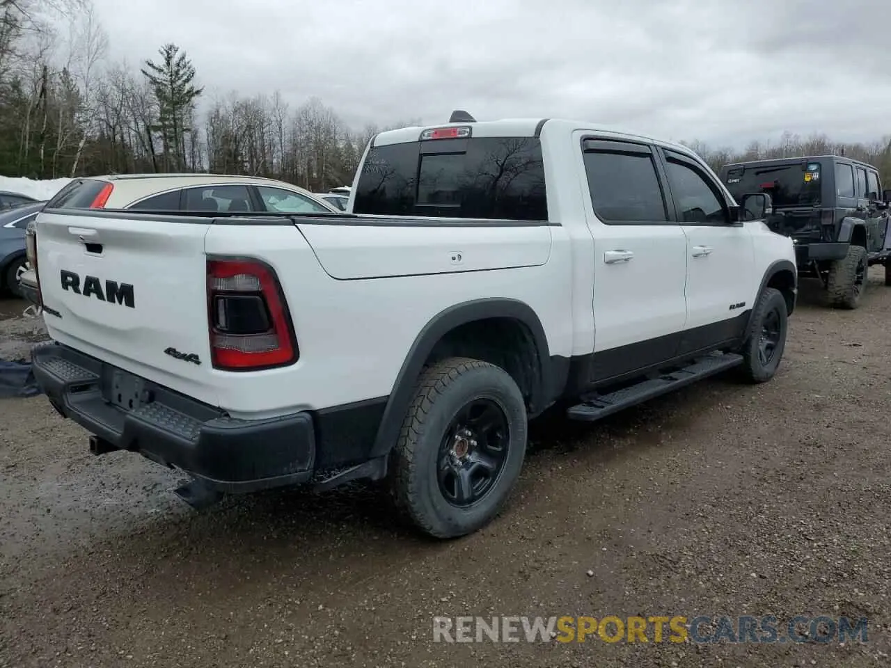 3 Photograph of a damaged car 1C6SRFLT8KN890137 RAM 1500 2019