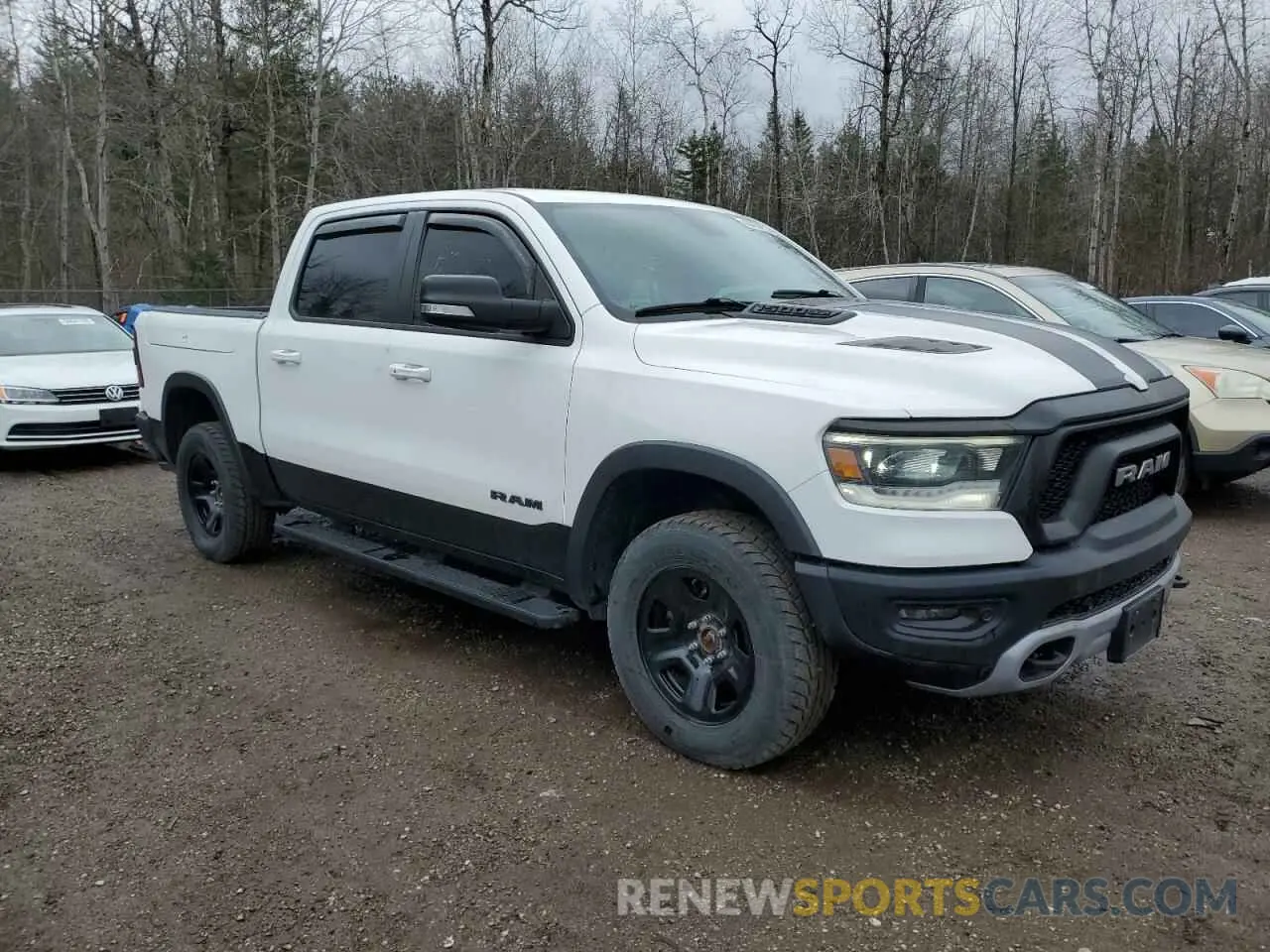 4 Photograph of a damaged car 1C6SRFLT8KN890137 RAM 1500 2019