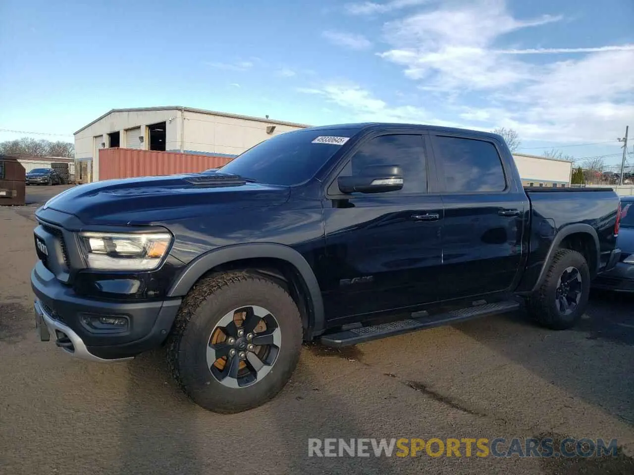 1 Photograph of a damaged car 1C6SRFLT9KN565450 RAM 1500 2019
