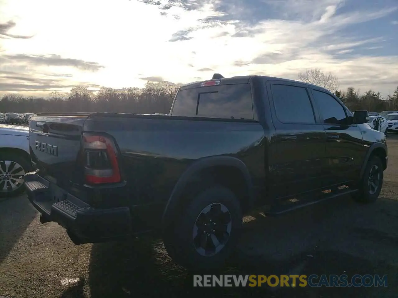 3 Photograph of a damaged car 1C6SRFLT9KN565450 RAM 1500 2019
