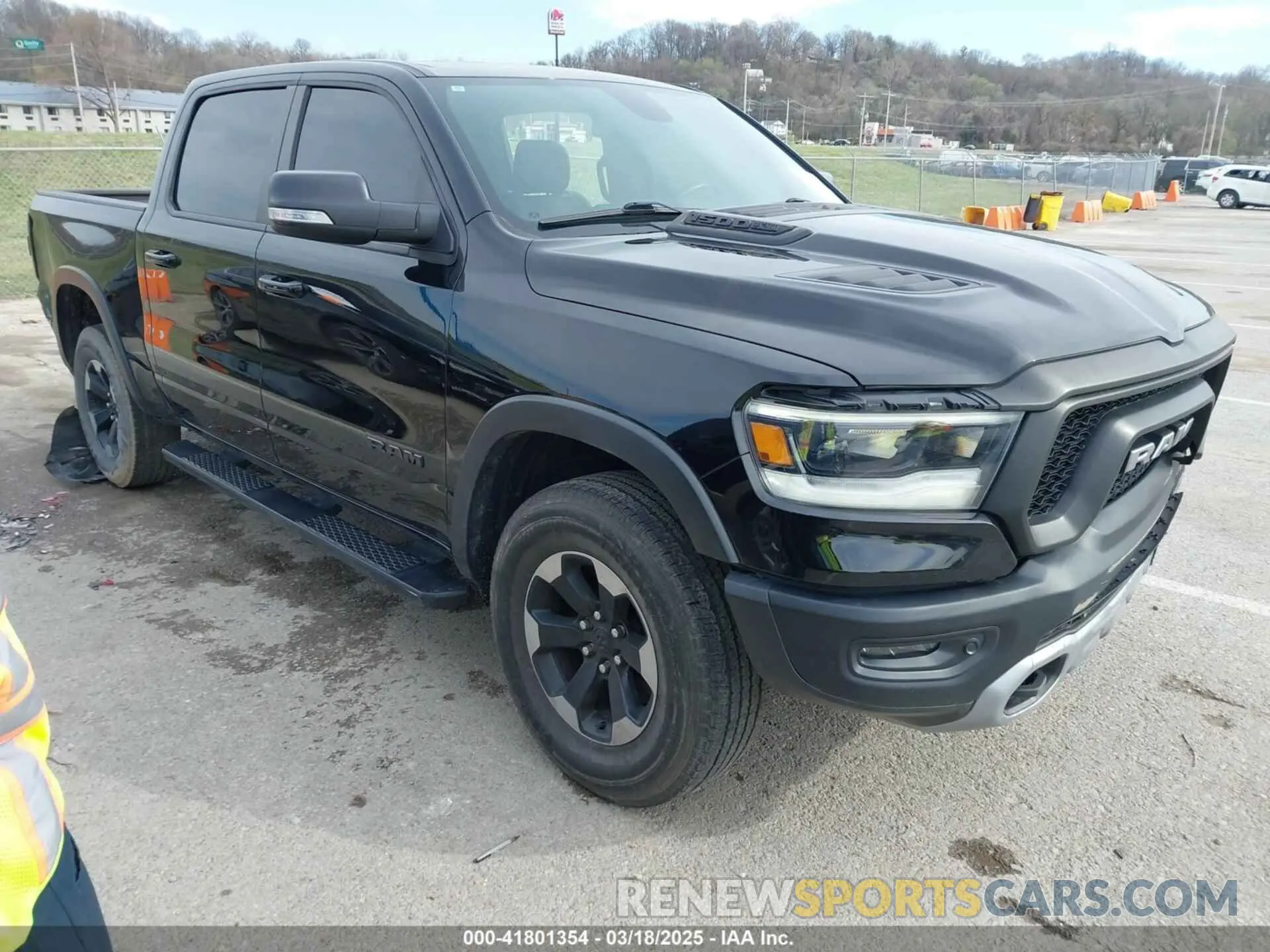 1 Photograph of a damaged car 1C6SRFLT9KN690335 RAM 1500 2019