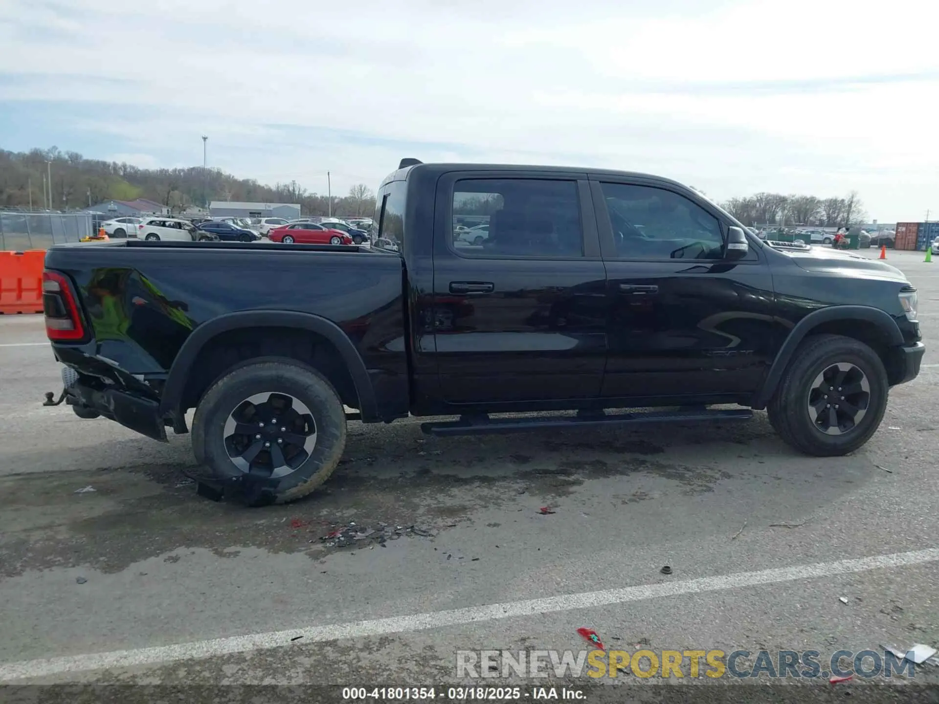 13 Photograph of a damaged car 1C6SRFLT9KN690335 RAM 1500 2019