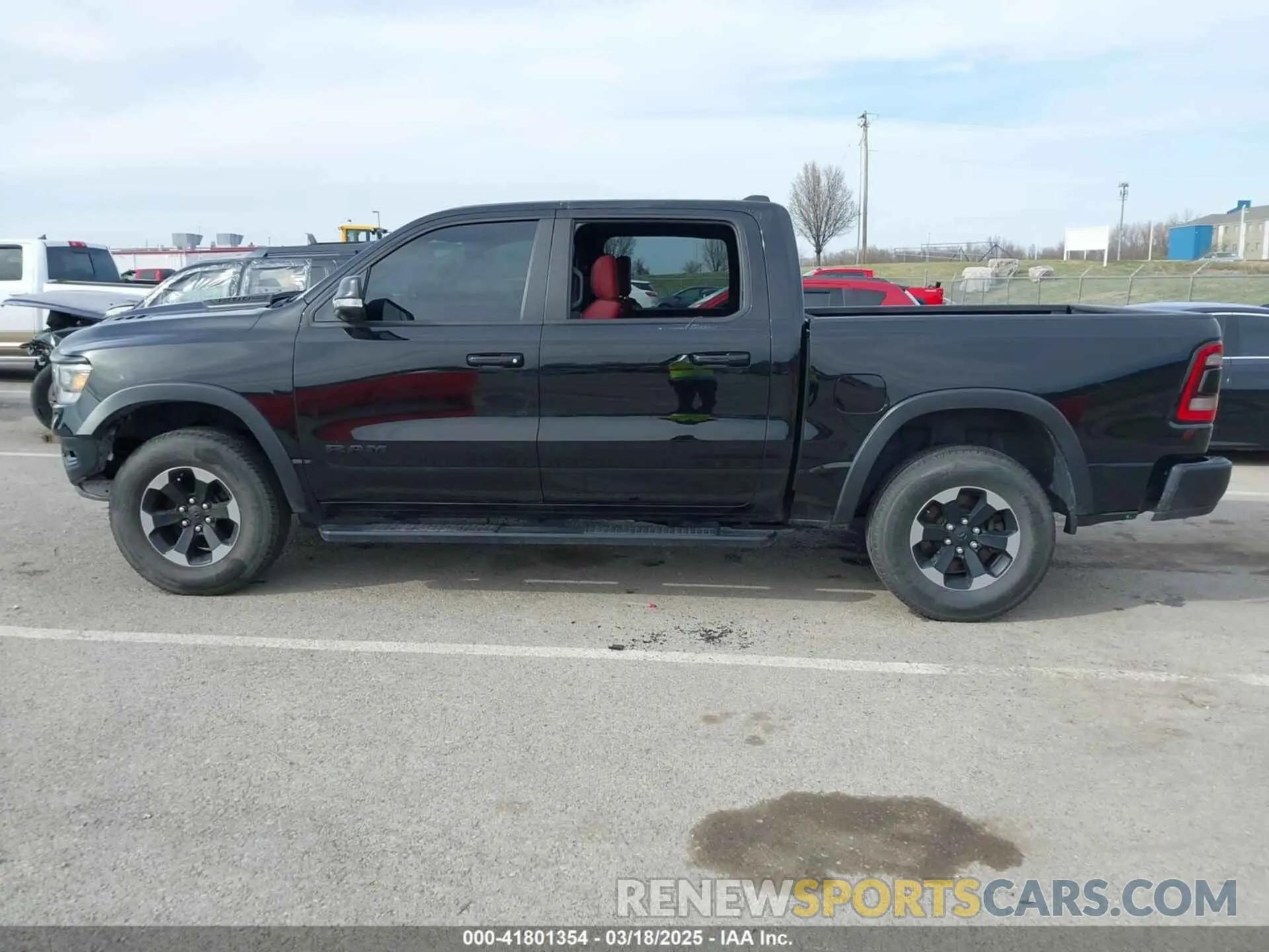 14 Photograph of a damaged car 1C6SRFLT9KN690335 RAM 1500 2019