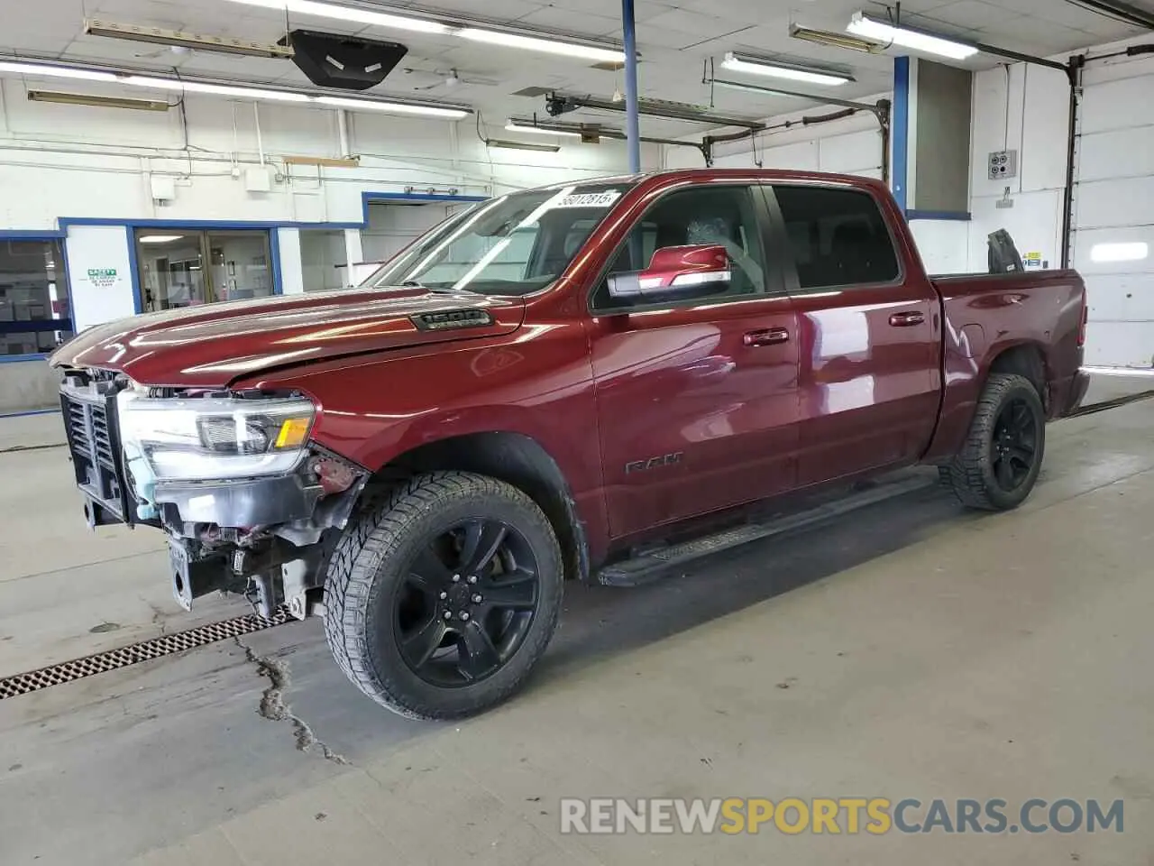1 Photograph of a damaged car 1C6SRFLTXKN843840 RAM 1500 2019
