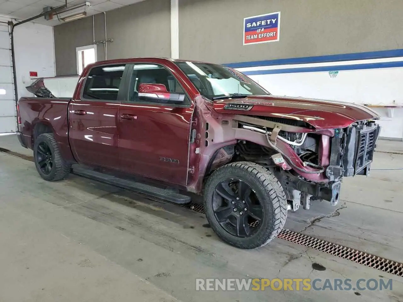 4 Photograph of a damaged car 1C6SRFLTXKN843840 RAM 1500 2019