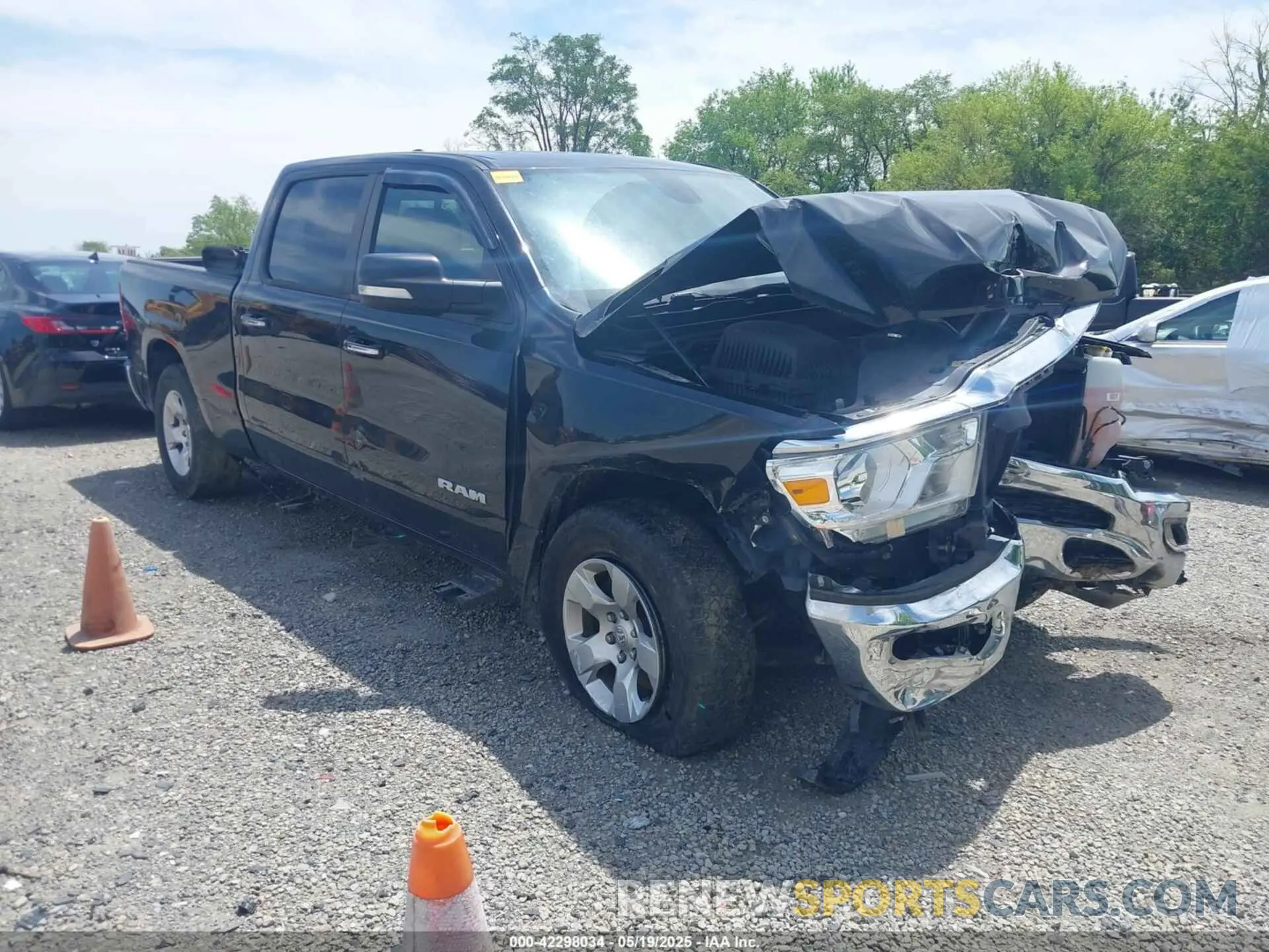 1 Photograph of a damaged car 1C6SRFMT0KN698483 RAM 1500 2019