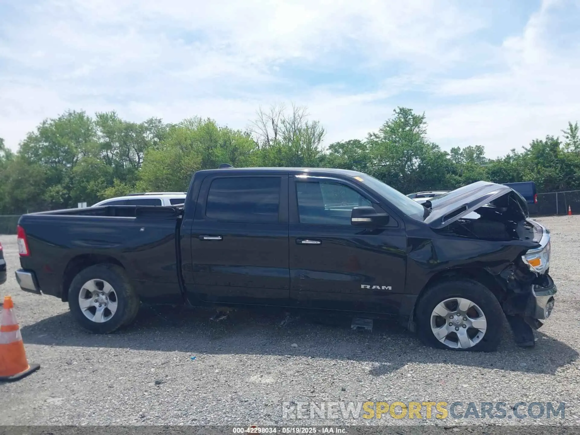 14 Photograph of a damaged car 1C6SRFMT0KN698483 RAM 1500 2019