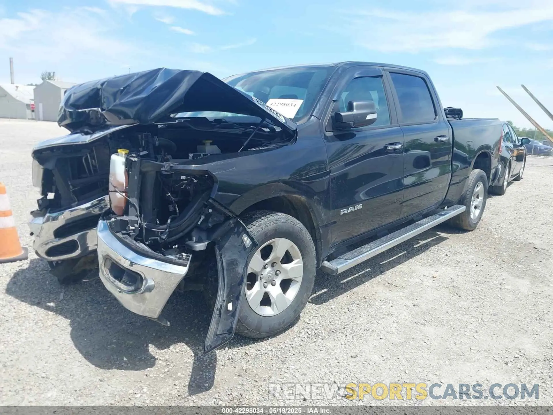2 Photograph of a damaged car 1C6SRFMT0KN698483 RAM 1500 2019