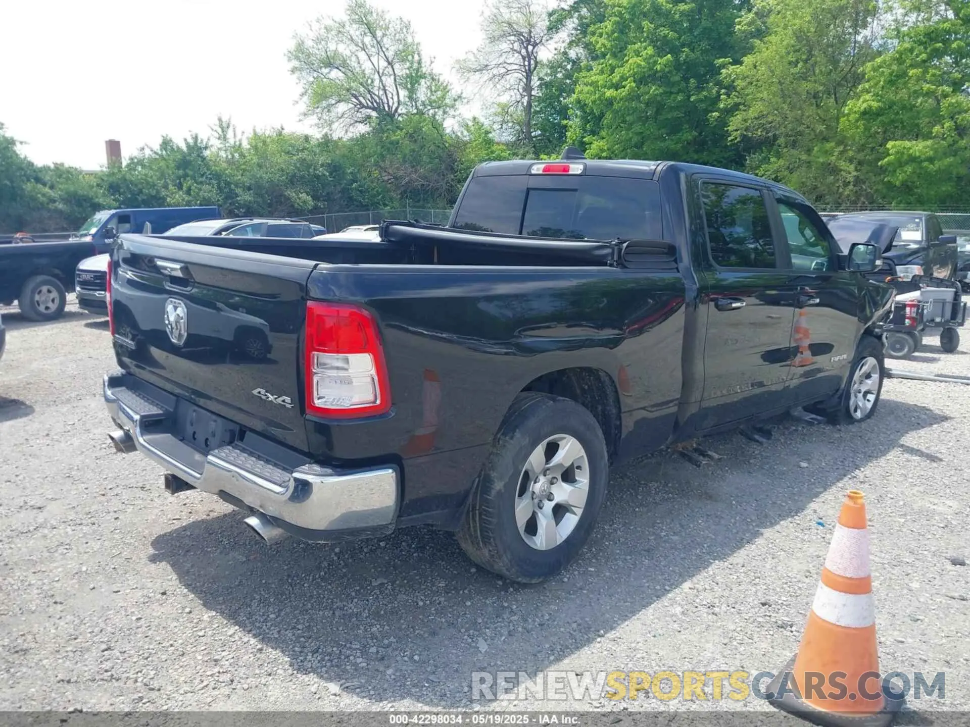 4 Photograph of a damaged car 1C6SRFMT0KN698483 RAM 1500 2019