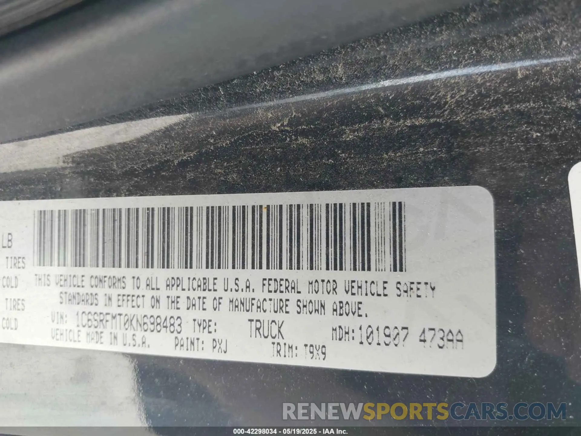 9 Photograph of a damaged car 1C6SRFMT0KN698483 RAM 1500 2019