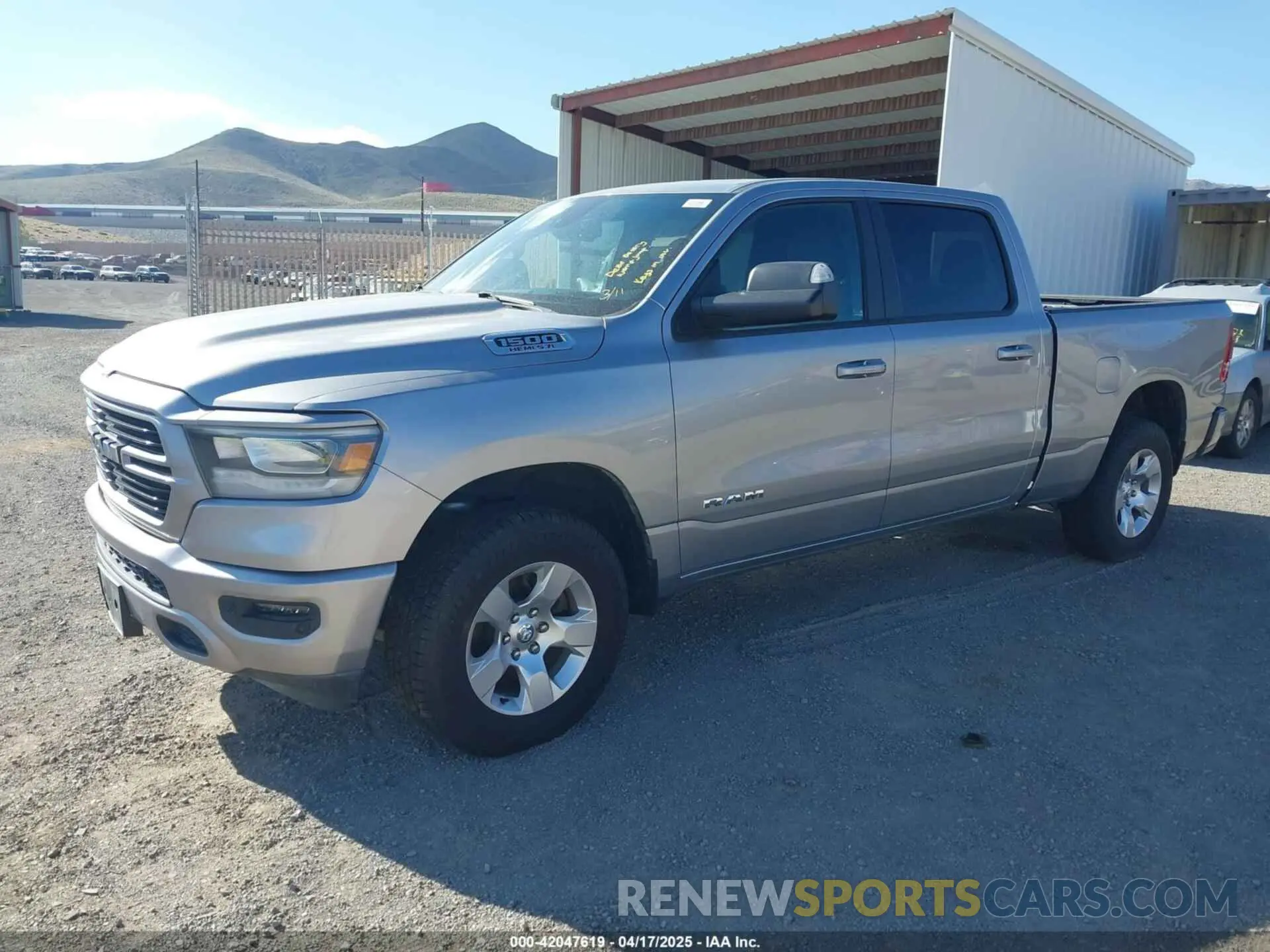 2 Photograph of a damaged car 1C6SRFMT2KN521613 RAM 1500 2019