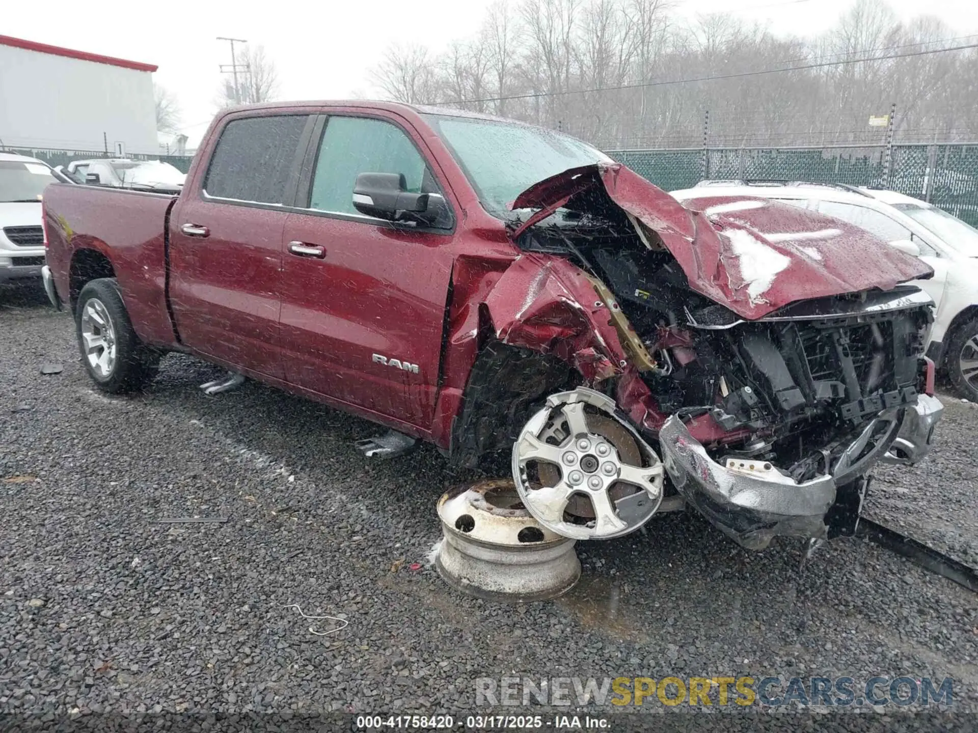 1 Photograph of a damaged car 1C6SRFMT2KN577034 RAM 1500 2019