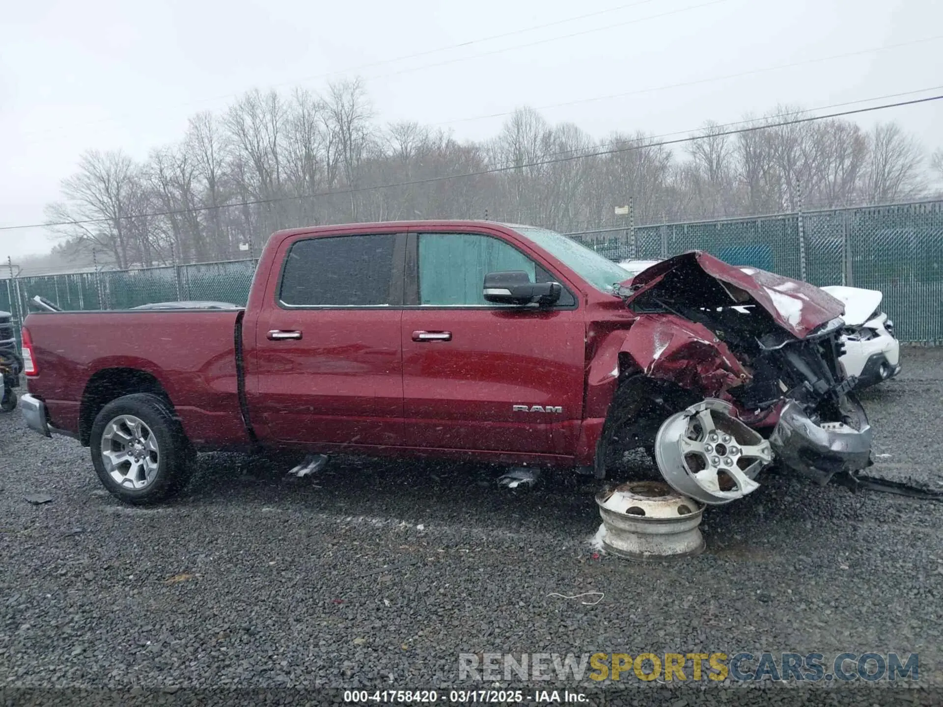 13 Photograph of a damaged car 1C6SRFMT2KN577034 RAM 1500 2019