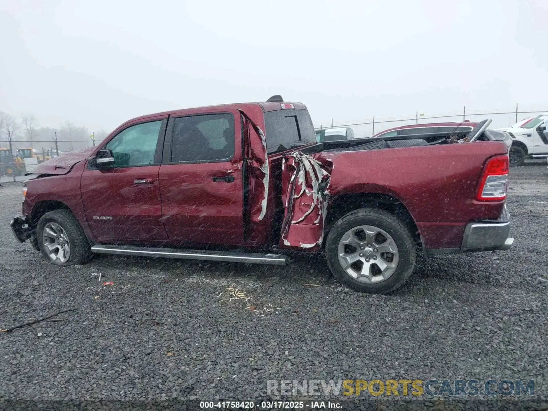 14 Photograph of a damaged car 1C6SRFMT2KN577034 RAM 1500 2019