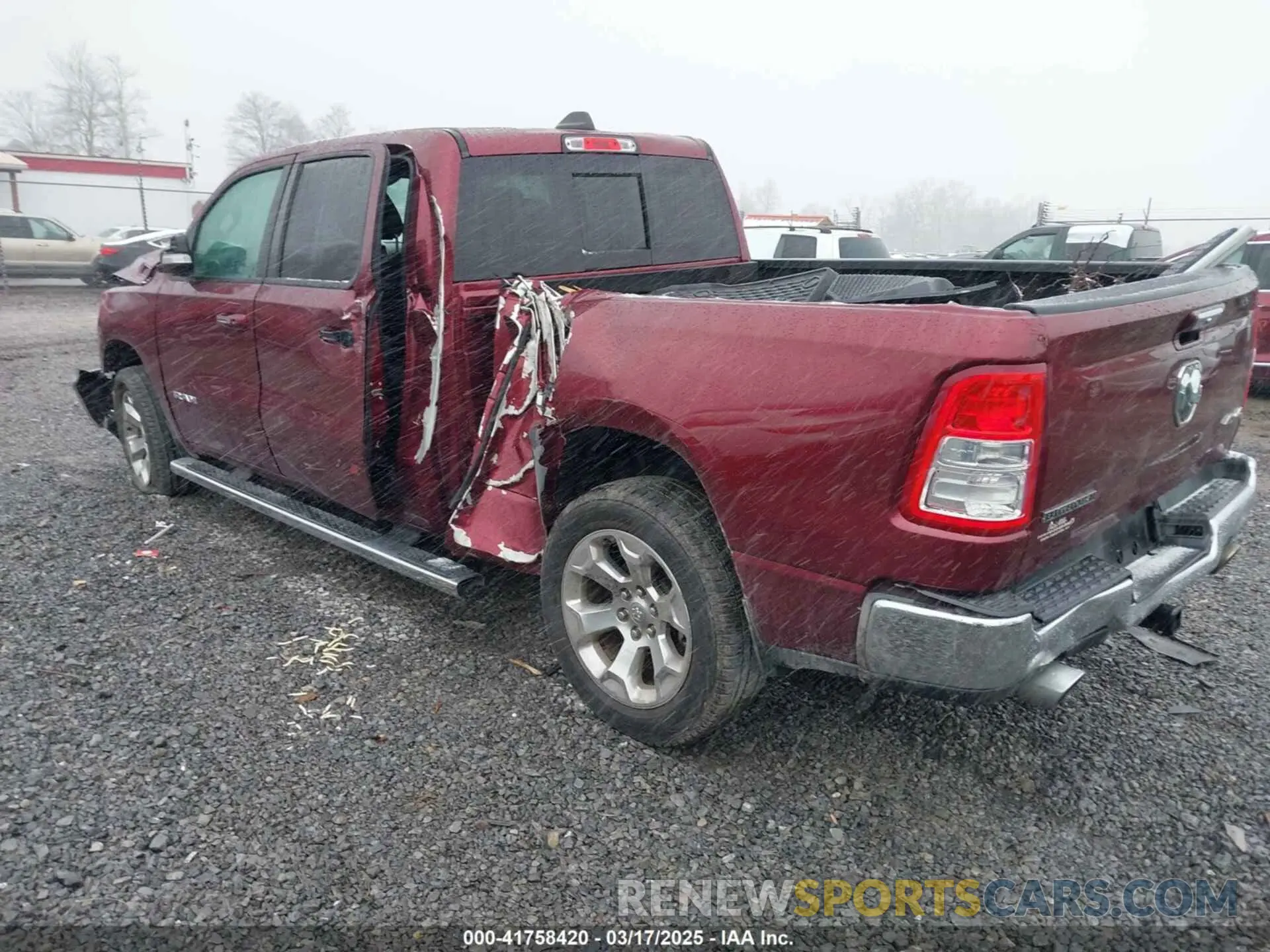 3 Photograph of a damaged car 1C6SRFMT2KN577034 RAM 1500 2019
