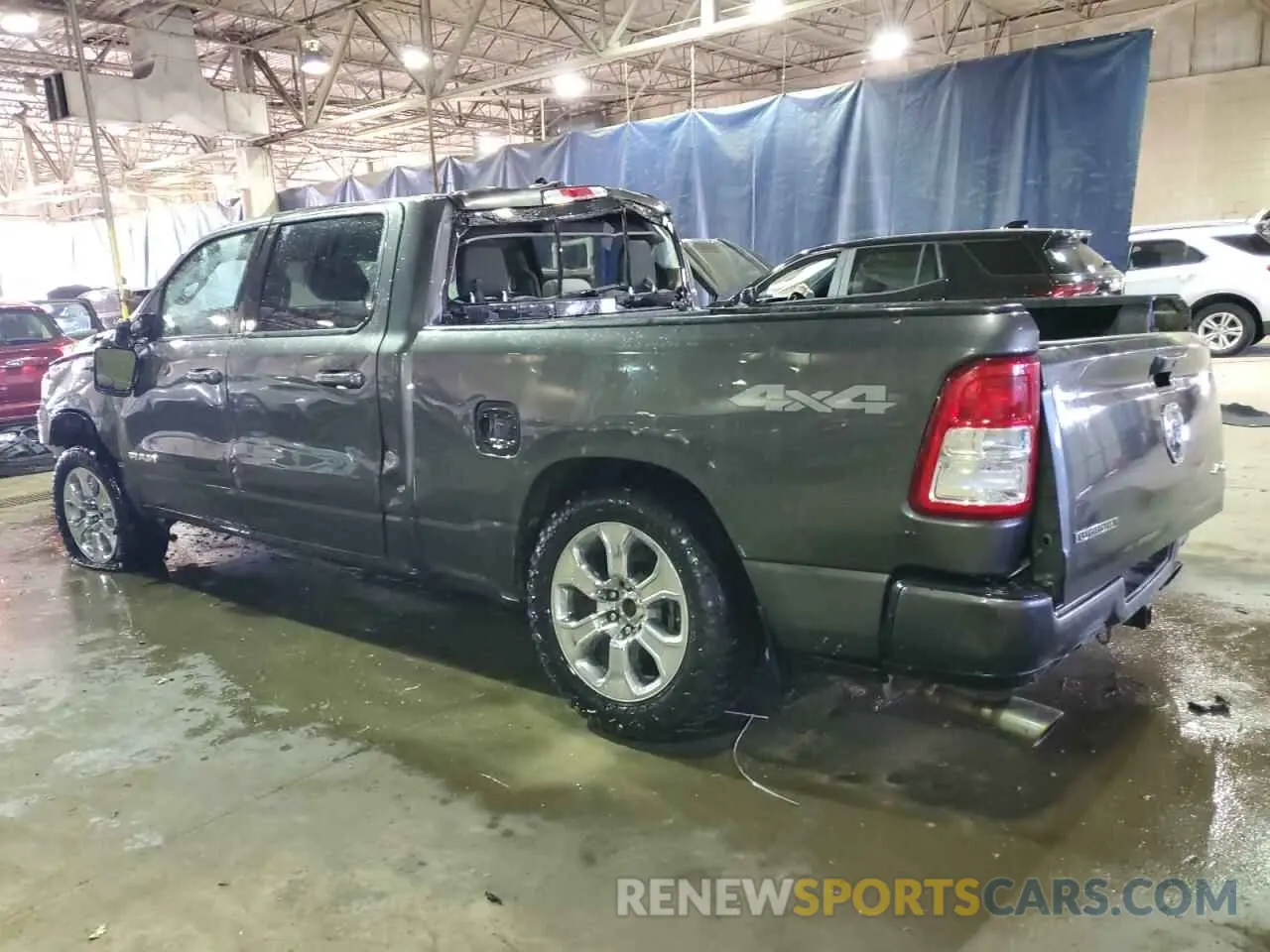 2 Photograph of a damaged car 1C6SRFMT3KN691897 RAM 1500 2019
