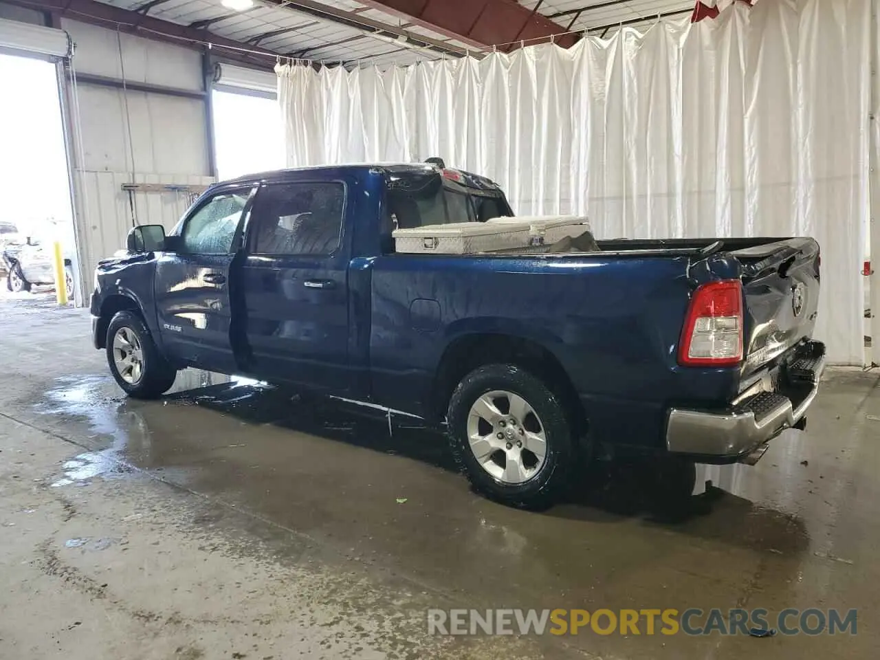 2 Photograph of a damaged car 1C6SRFMT5KN607949 RAM 1500 2019