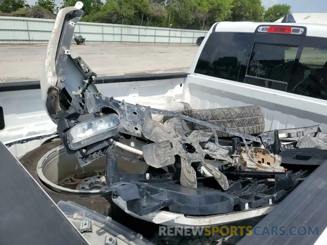 12 Photograph of a damaged car 1C6SRFMT6KN528452 RAM 1500 2019