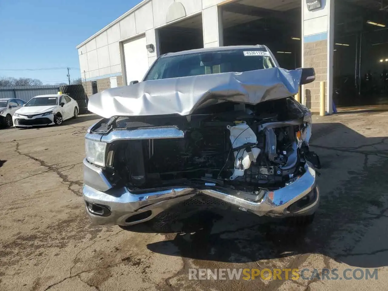 5 Photograph of a damaged car 1C6SRFMT6KN587405 RAM 1500 2019