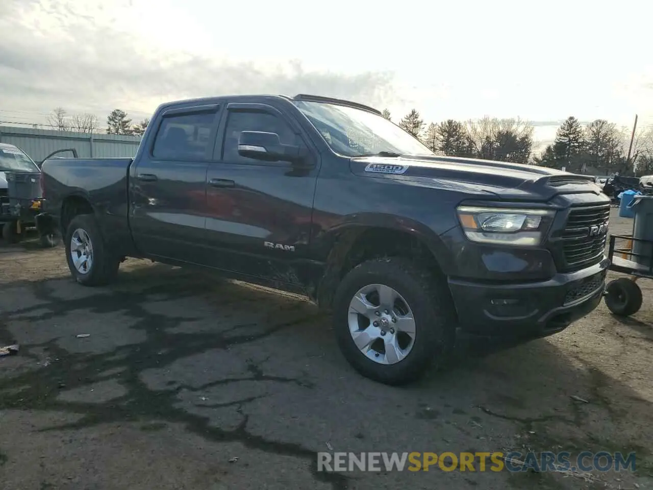 4 Photograph of a damaged car 1C6SRFMT6KN699833 RAM 1500 2019