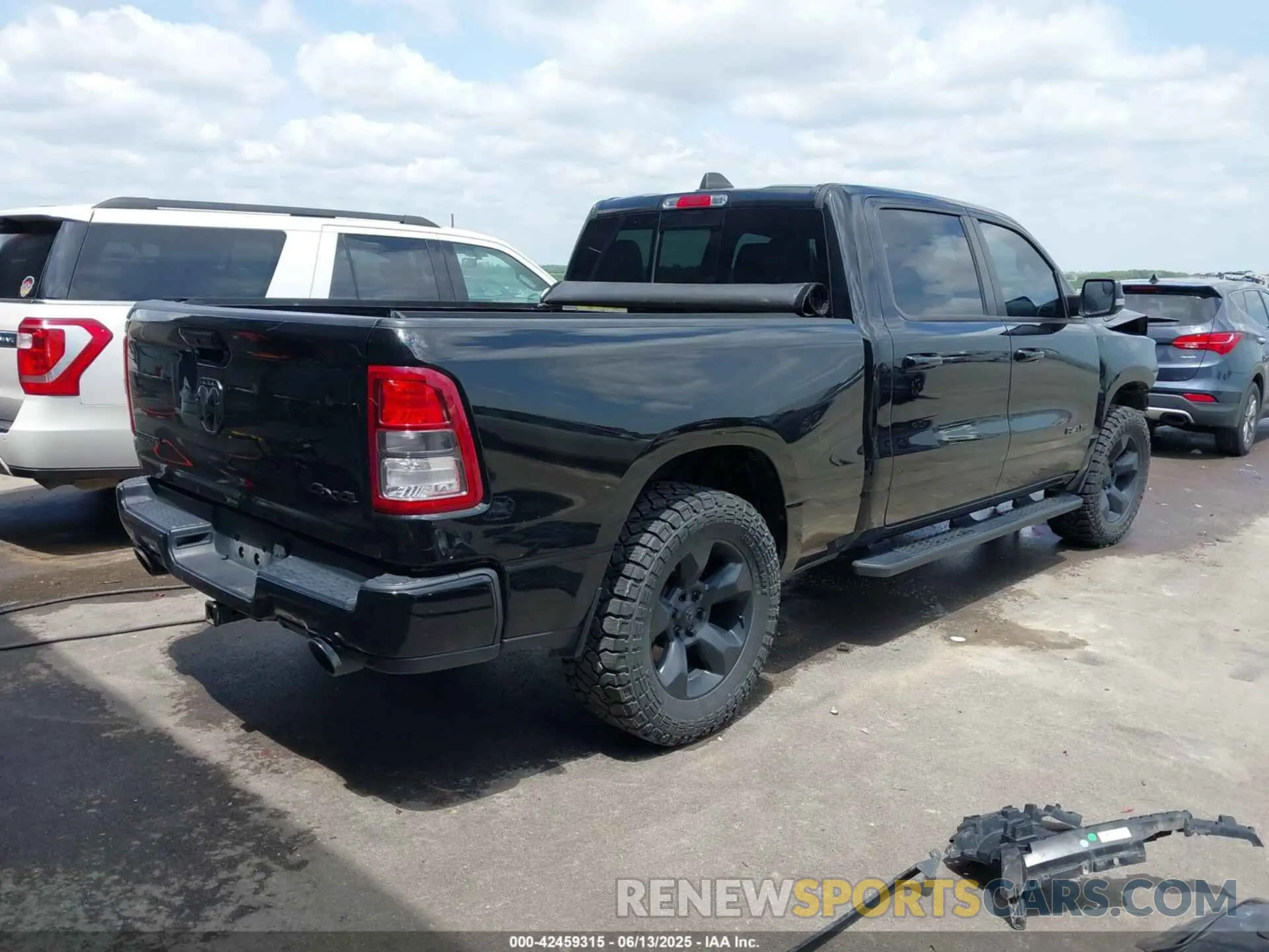 4 Photograph of a damaged car 1C6SRFMT7KN736680 RAM 1500 2019
