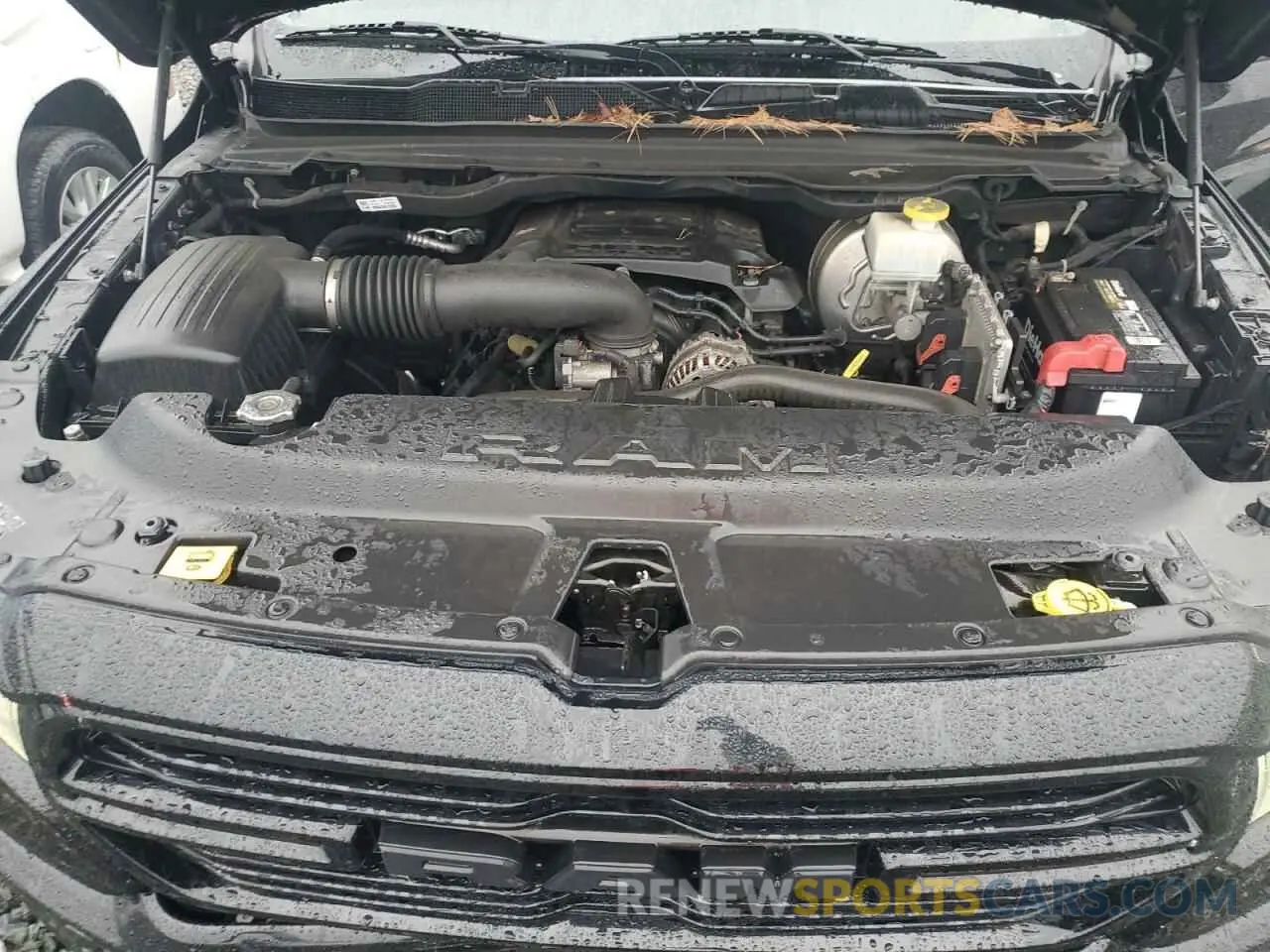 11 Photograph of a damaged car 1C6SRFMT8KN848209 RAM 1500 2019