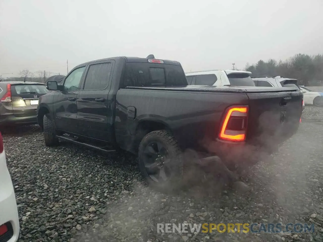 2 Photograph of a damaged car 1C6SRFMT8KN848209 RAM 1500 2019