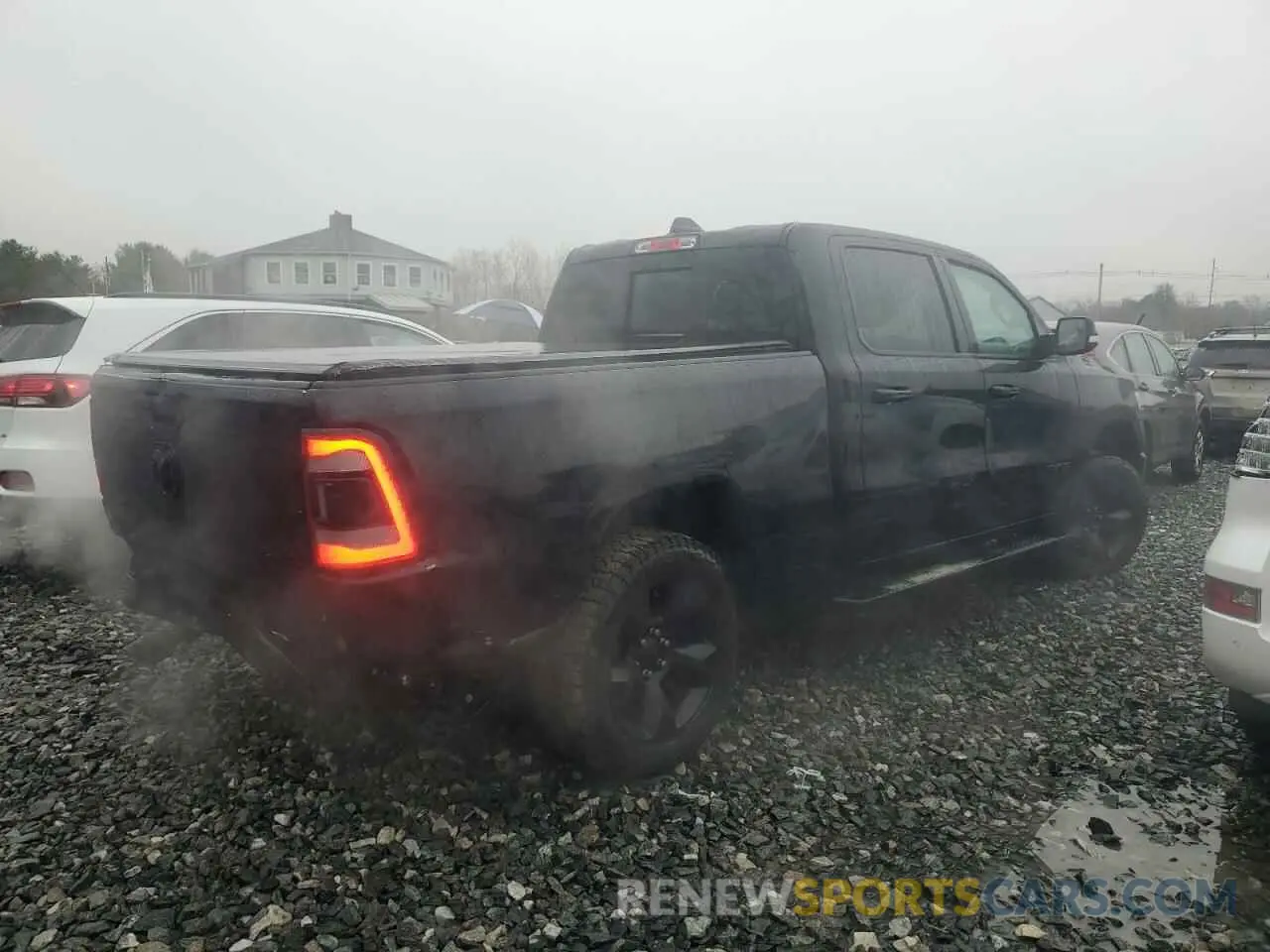 3 Photograph of a damaged car 1C6SRFMT8KN848209 RAM 1500 2019